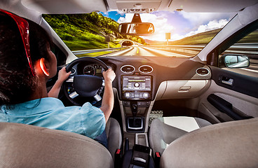 Image showing Woman behind the wheel of a car.