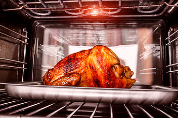 Image showing Roast chicken in the oven.