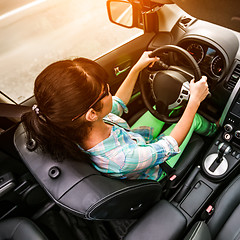 Image showing Woman behind the wheel of a car.