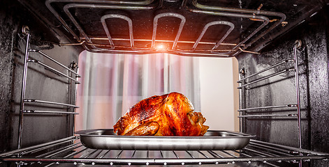 Image showing Roast chicken in the oven.