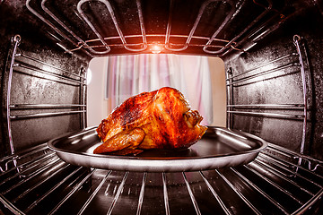 Image showing Roast chicken in the oven.