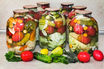 Image showing  A variety of canned vegetables in glass jars.