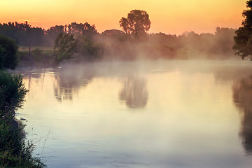 Image showing Early foggy morning and a small river.