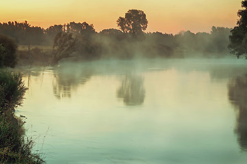 Image showing Early foggy morning and a small river.