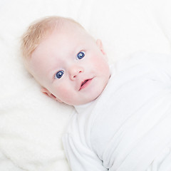 Image showing Baby with blue eyes