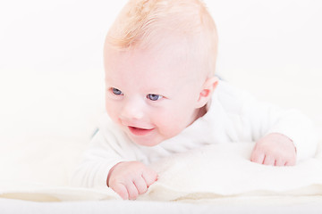 Image showing Baby with plush toy.