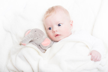 Image showing Baby with plush toy.