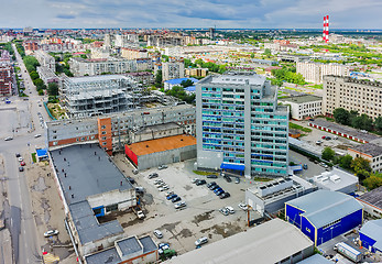 Image showing Aerial view of office building and urban quarters