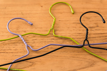 Image showing three colored hangers