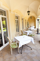 Image showing little tables at cafe  