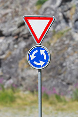 Image showing Roundabout crossroad road traffic sign, blue