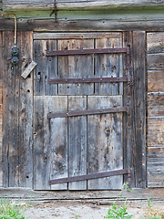 Image showing Old door in a wooden shed