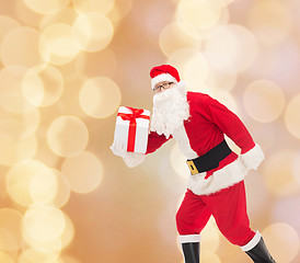 Image showing man in costume of santa claus with gift box