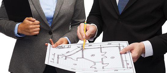 Image showing businesspeople with clipboard and blueprint