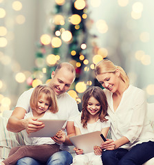 Image showing happy family with tablet pc computers