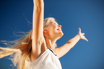 Image showing beautiful woman enjoying summer outdoors