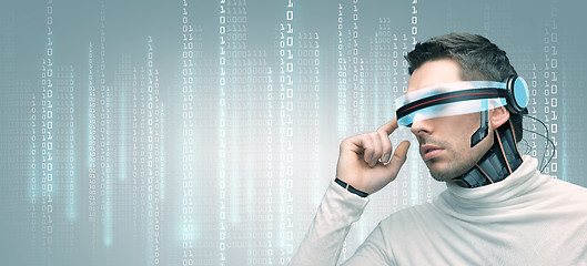 Image showing man with futuristic 3d glasses and sensors