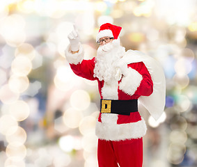 Image showing man in costume of santa claus with bag