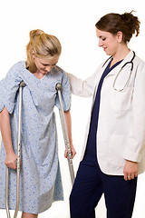 Image showing Doctor helping patient