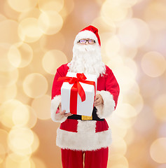 Image showing man in costume of santa claus with gift box