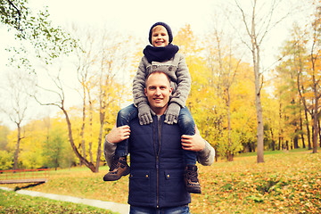 Image showing happy family having fun in autumn park