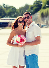 Image showing smiling couple in city