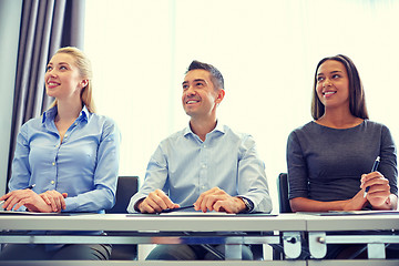 Image showing smiling business people meeting in office