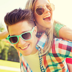 Image showing smiling couple having fun in park