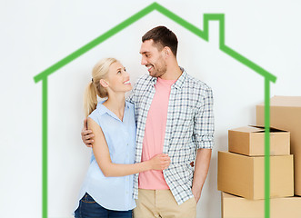 Image showing couple with cardboard boxes moving to new home