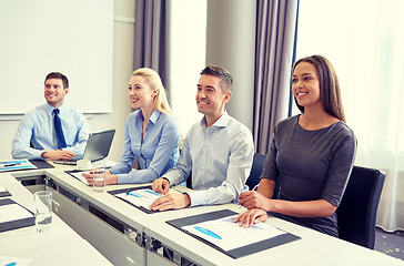 Image showing smiling business people meeting in office