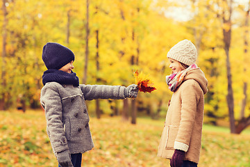 Image showing smiling children in autumn park