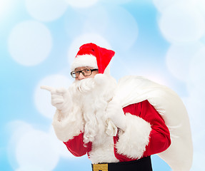 Image showing man in costume of santa claus with bag