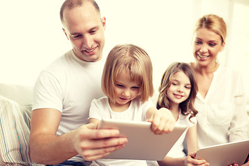 Image showing happy family with tablet pc computers at home