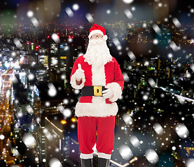 Image showing man in costume of santa claus with gift box