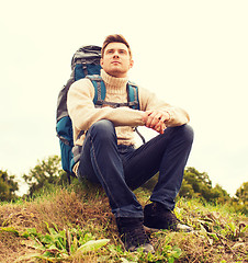 Image showing man with backpack hiking