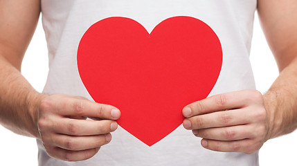 Image showing closeup of man hands with heart