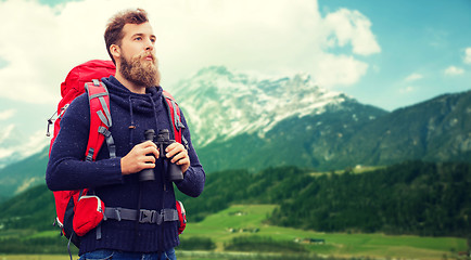 Image showing man with backpack and binocular outdoors