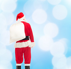 Image showing man in costume of santa claus with bag