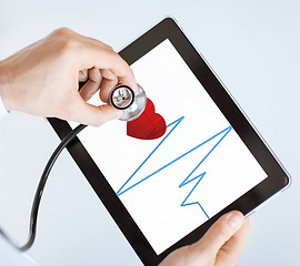 Image showing doctor with stethoscope and tablet pc