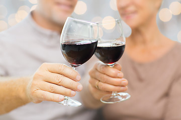 Image showing close up of happy senior couple with red wine