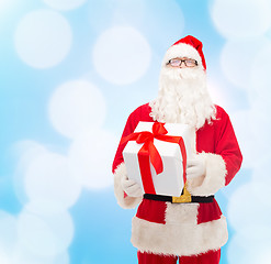 Image showing man in costume of santa claus with gift box