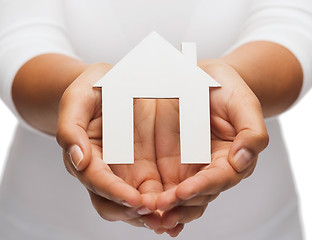 Image showing woman hands with paper house