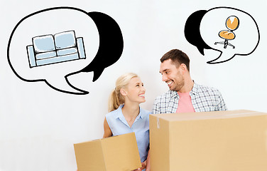 Image showing couple with delivery boxes moving to new home