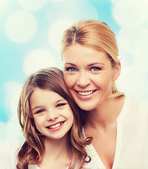 Image showing smiling mother and little girl