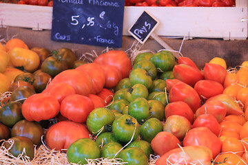 Image showing Tomatoes at a market stall