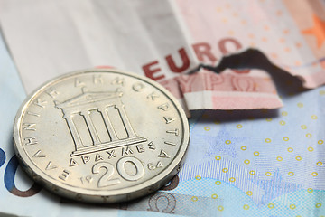 Image showing Greek coins on euro notes