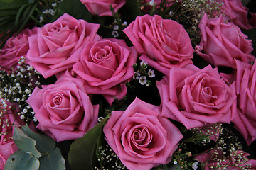 Image showing Big pink roses in a bridal bouquet