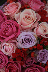 Image showing Bridal roses in pink and purple