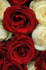 Image showing Red and white roses in a wedding arrangement