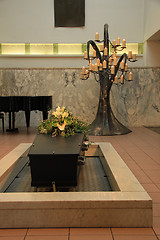 Image showing Coffin with funeral flowers